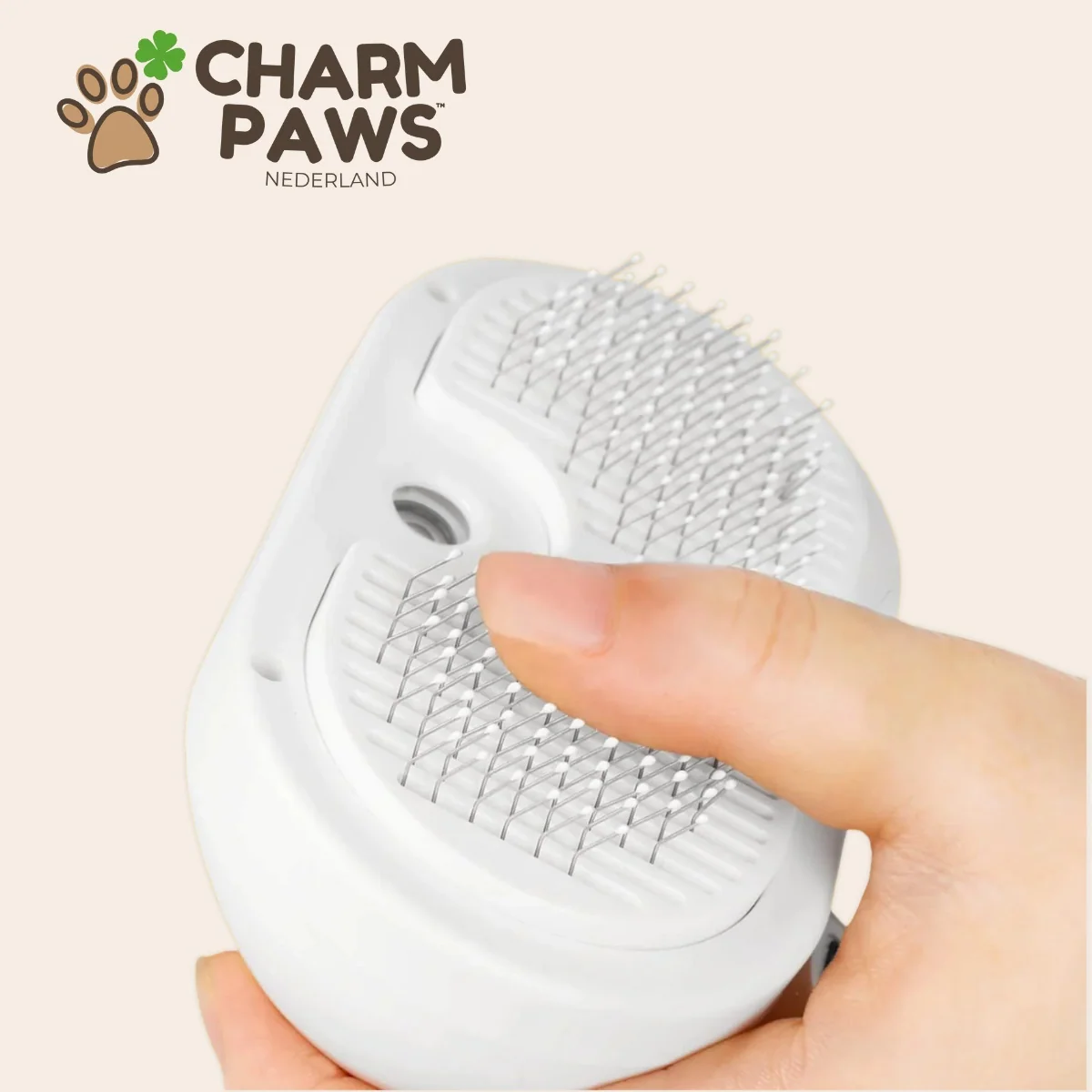 CharmPaws Steami Pro professional coat grooming brush for pets, shown in the image with multiple grooming brushes.